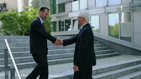 Two businessmen shaking hands Video stock 12234255