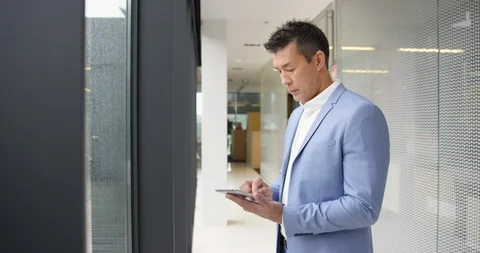 Two Businessmen Talking In An Office Corridor Stock Footage 97121812
