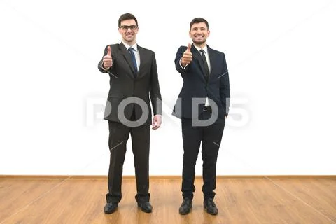 The two businessmen thumb up on the white wall background Stock Photos