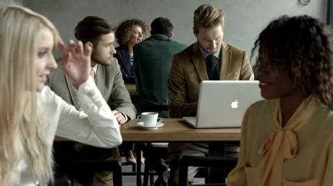 Two businessmen working at a cafe. Stock Footage 61157509