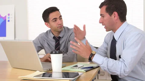 Two businessmen working at desk Video stock 25542046