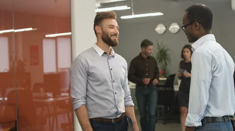 Two businesspartners handshaking after great work together Stock Footage 68334886