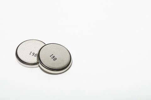 Two button cell batteries Stock Photos