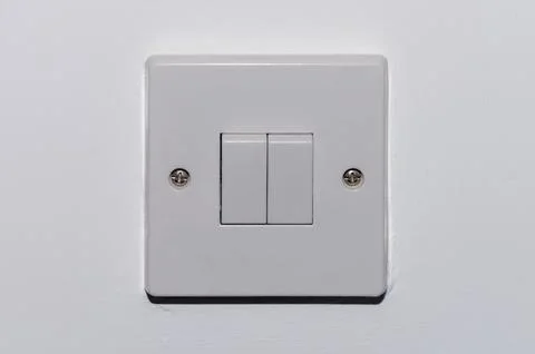 Two button switch on a white wall 2 Stock Photos