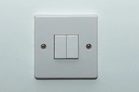 Two button switch on a white wall 1 Stock Photos