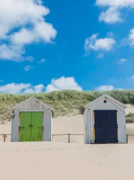 Two cabins or huts on the beach Stock Photos