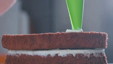 Two cake. The process of making a cake in a candy store Stock Footage 69140584