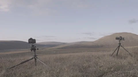 Two cameras making timelapse in north mountains 4K Stock Footage 235660278
