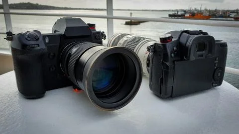Two cameras side by side Stock Photos