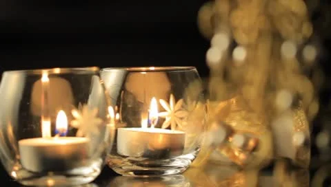 Two Candles And Christmas Tree Stock Footage 8908732