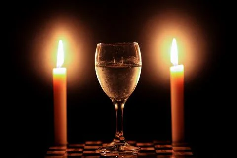 Two candles and ice Stock Photos