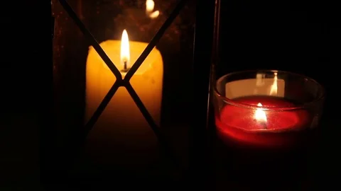 Two candles burning in the dark Stock Footage 71353720