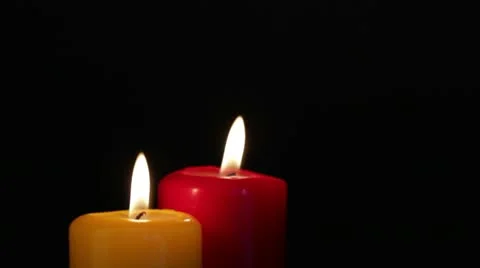 Two candles burning Stock Footage 10578470