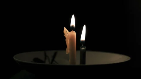 Two candles burning timelapse Stock Footage 34599604