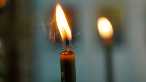 Two Candles close up burn in an Orthodox church. Religion, holidays, concept Stock Footage 204905847