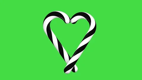Two candy cane lollipops with black and white stripes form a heart shape Stock Footage 323450040