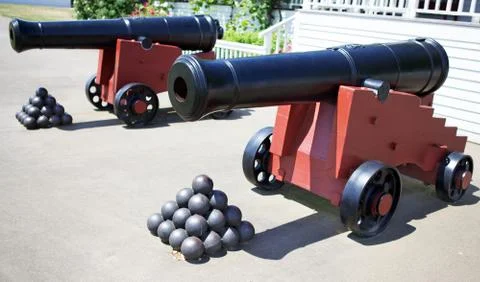 Two cannons with balls Stock Photos
