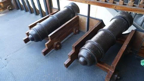 Two Cannons on a Ship Deck Historical Naval Artillery Stock Photos