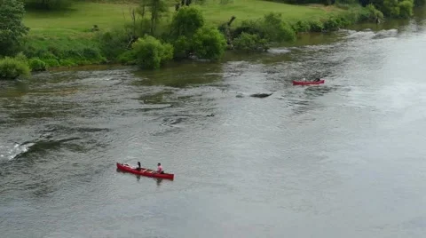 Two canoes  on The New River Stock Footage 52376043