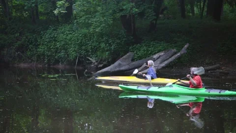 Two Canoes on River with medium speed Stock Footage 195091640