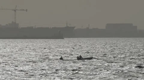 Two canoes sailing in the bay of Dakar, Senegal Stock Footage 47944057