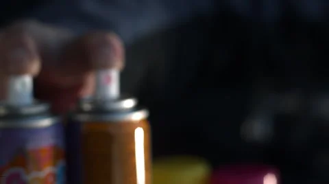 Two cans of silly string shooting in slow motion Stock Footage 62344762