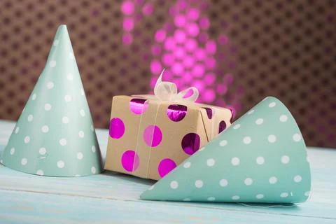 Two caps and a gift Stock Photos