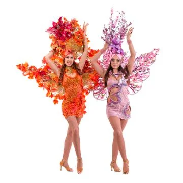 Two carnival dancer women dancing against isolated white 스톡 사진