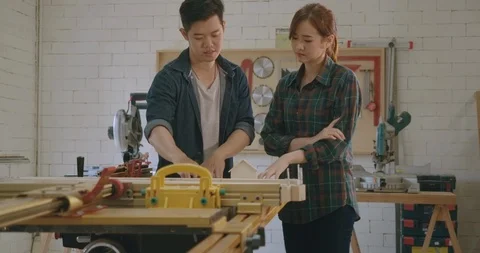 Two carpenter teamwork building design wood house model  動画素材 126399665