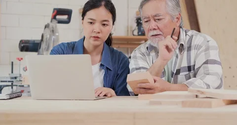 Two carpenter working together at workshop. 스톡 동영상 119007093