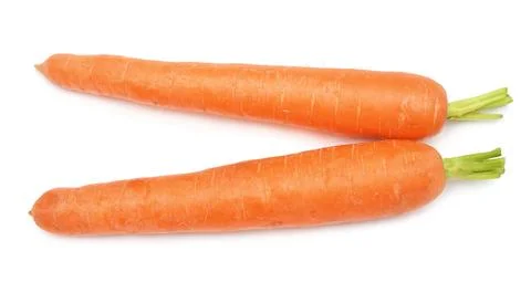 Two carrot isolated on white background. Creative healthy food concept. Nat.. Stock Photos