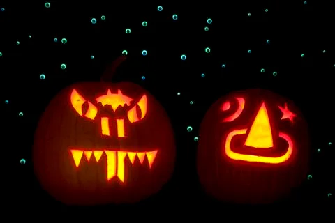 Two carved pumpkins Stock Photos