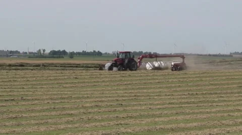 Two Case Tractors Raking Set Shot Stock Footage 40462680