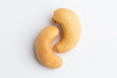 Two cashews isolated on a white background Stock Photos