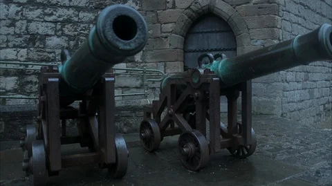 Two castle canons in the courtyard of a castle fort Stock Footage 128639695