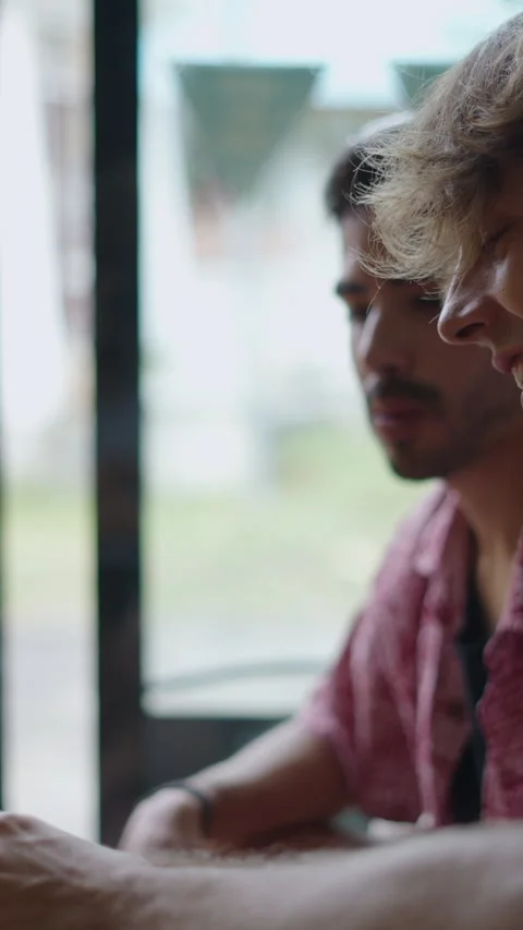 Two Caucasian men prepare a joint Stock Footage 267507341