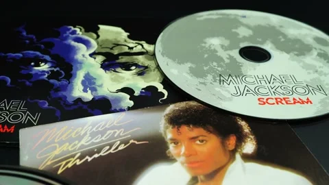 Two CD covers by Michael Jackson. The SCREAM compilation, and the 1982 classi Stock Footage 171187684