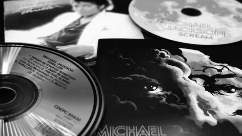 Two CD covers by Michael Jackson. The SCREAM compilation, and the 1982 classi Stock Footage 171299376
