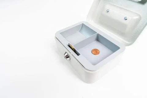 A two cent piece in an empty petty cash Stock Photos