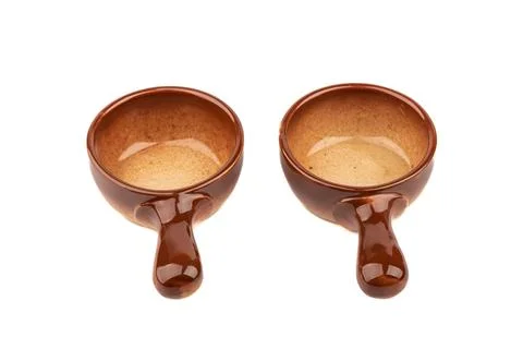 Two ceramic cocotte makers for baking isolated on white background. Stock Photos