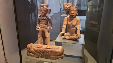 Two Ceramic Figures on Pedestal, Museo Chileno de Arte Precolombino, Chile 8K Stock Footage 331543459