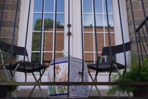 Two Chairs on a Balcony Фото