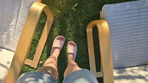 Two chairs on the lawn Stock Photos