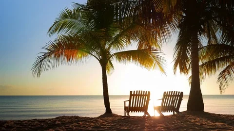Two Chairs Placed in the Sand Video stock 73997806