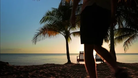 Two Chairs Placed in the Sand Stock Footage 74000833