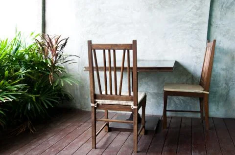 Two chairs with table in the garden Stock Photos