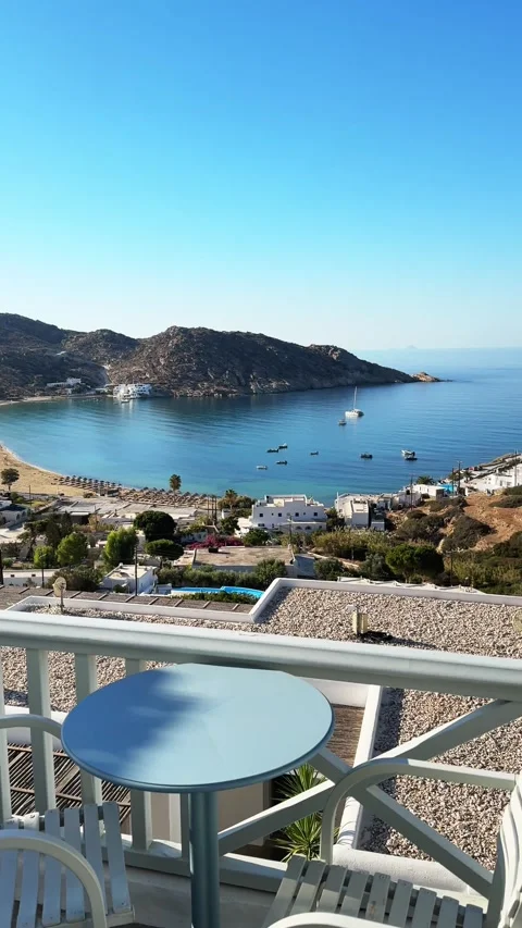 Two chairs with table on the terrace with sea view. Ios island, Greece Stock-Footage 300773073