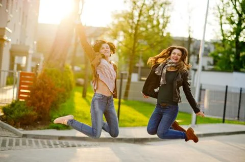 Two cheerful girlfriends Stock Photos