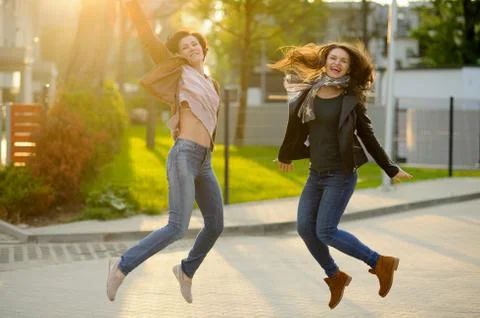 Two cheerful girlfriends Stock Photos