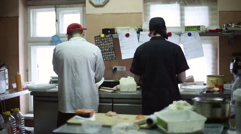 Two chefs cook in the kitchen Stock Footage 59698873